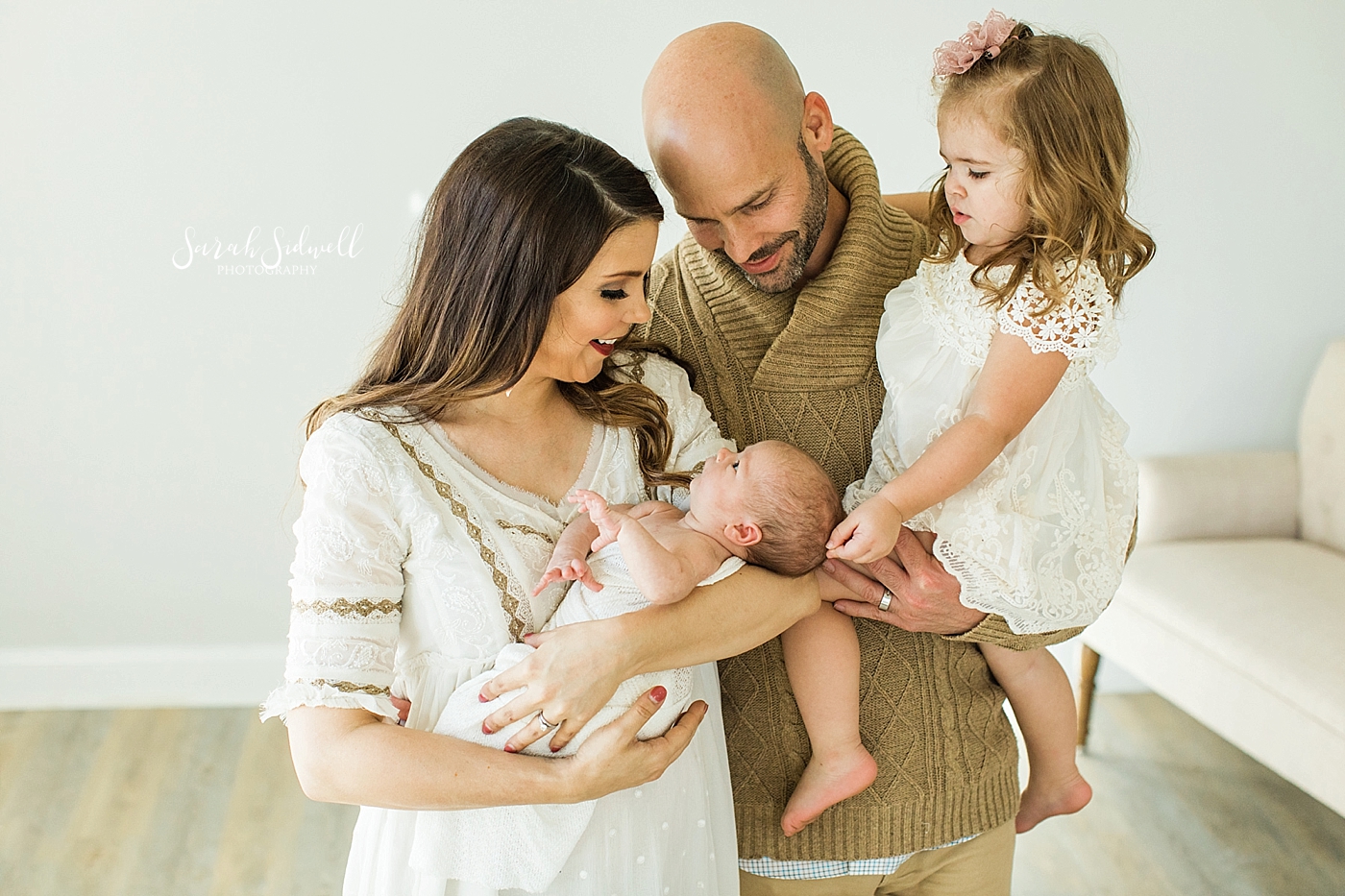 A family adores their new addition  | Sarah Sidwell Photography | Newborn Love