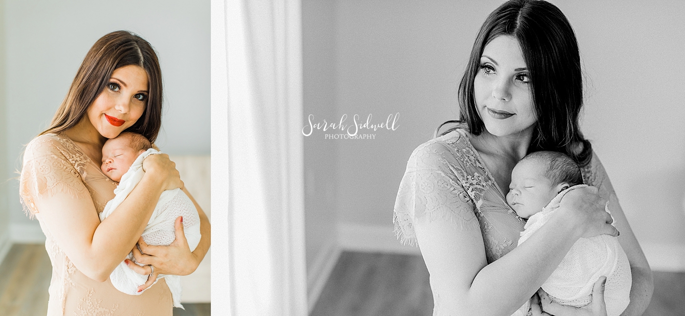 A mother rocks her new baby  | Sarah Sidwell Photography | Newborn Love