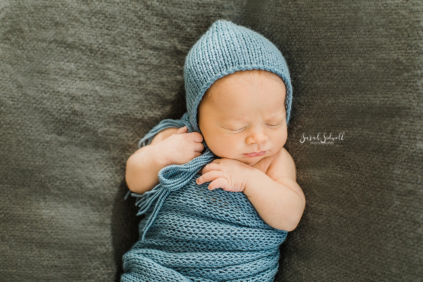 A baby boy sleeps  | Sarah Sidwell Photography | Newborn Love