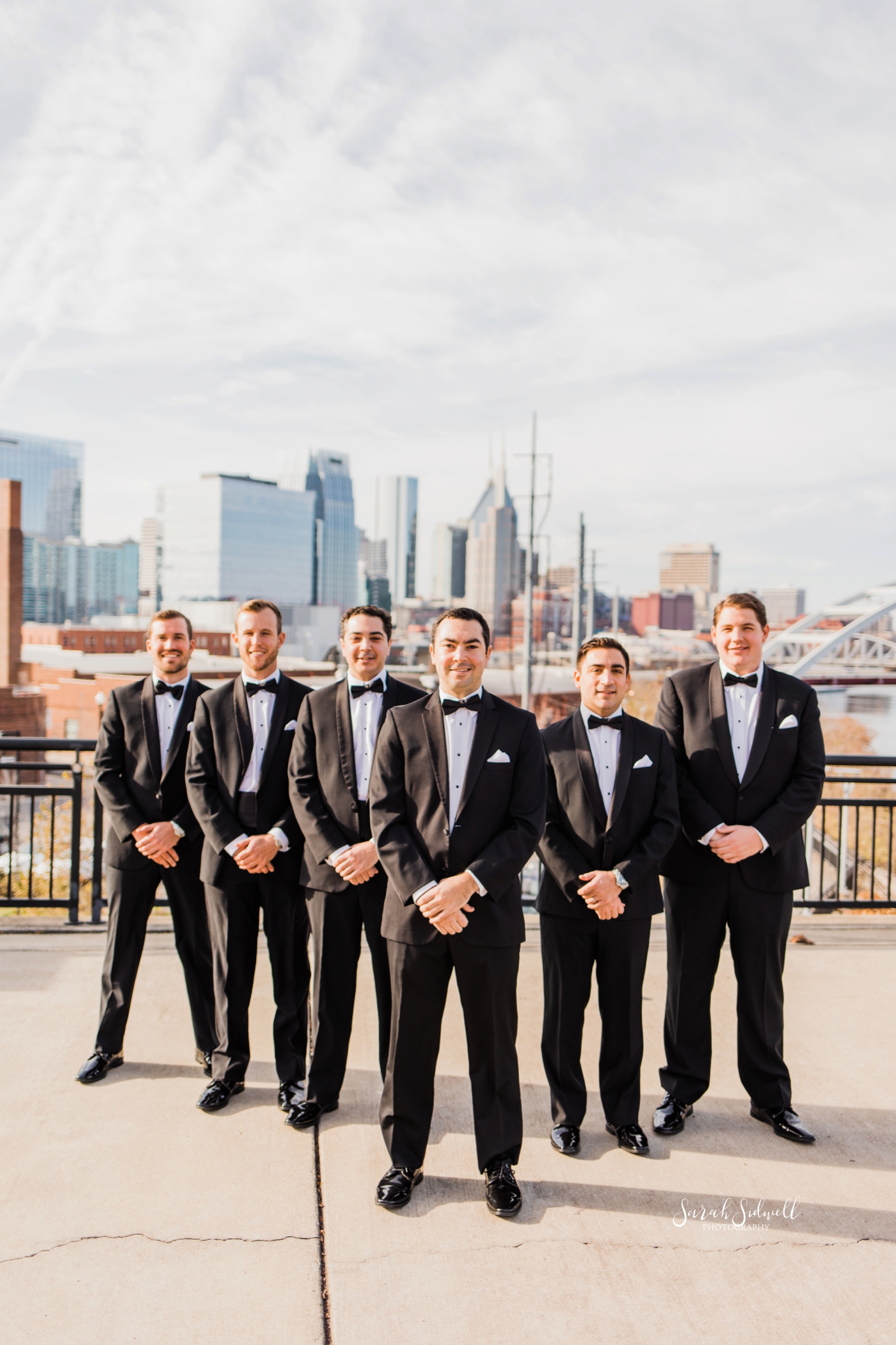 Groomsmen stand together | Sarah Sidwell Photography | The Bell Tower