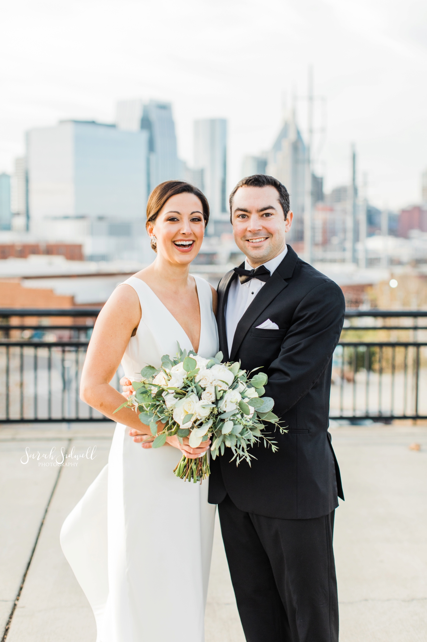 A couple pose for wedding photos | Sarah Sidwell Photography | The Bell Tower
