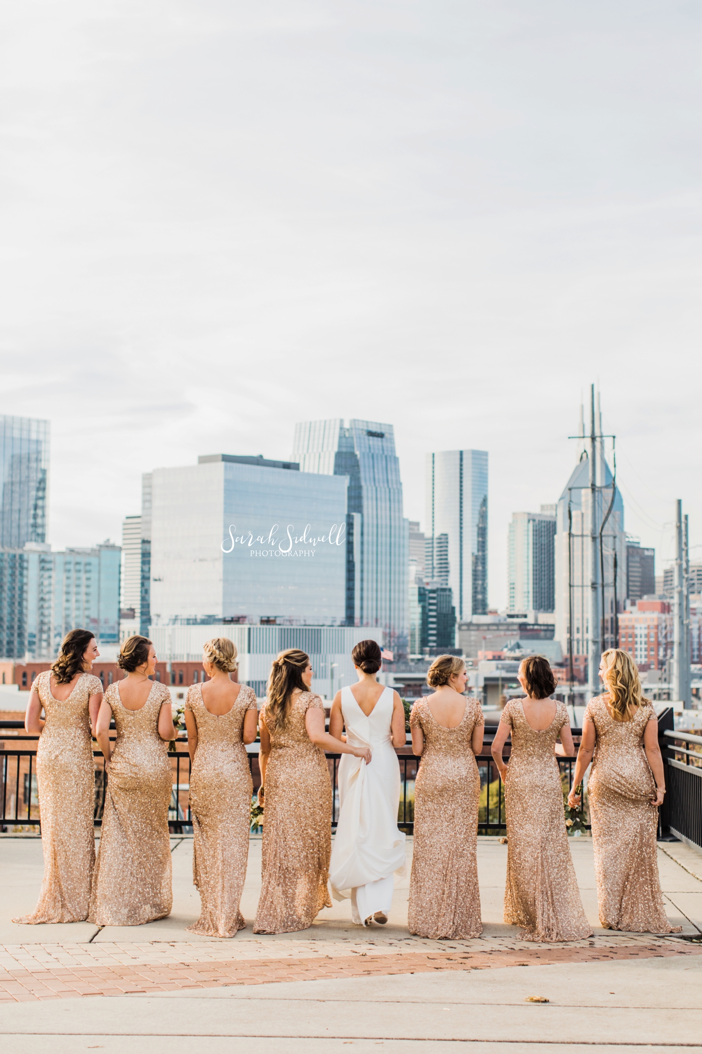 A bridal party shows off their dresses | Sarah Sidwell Photography | The Bell Tower
