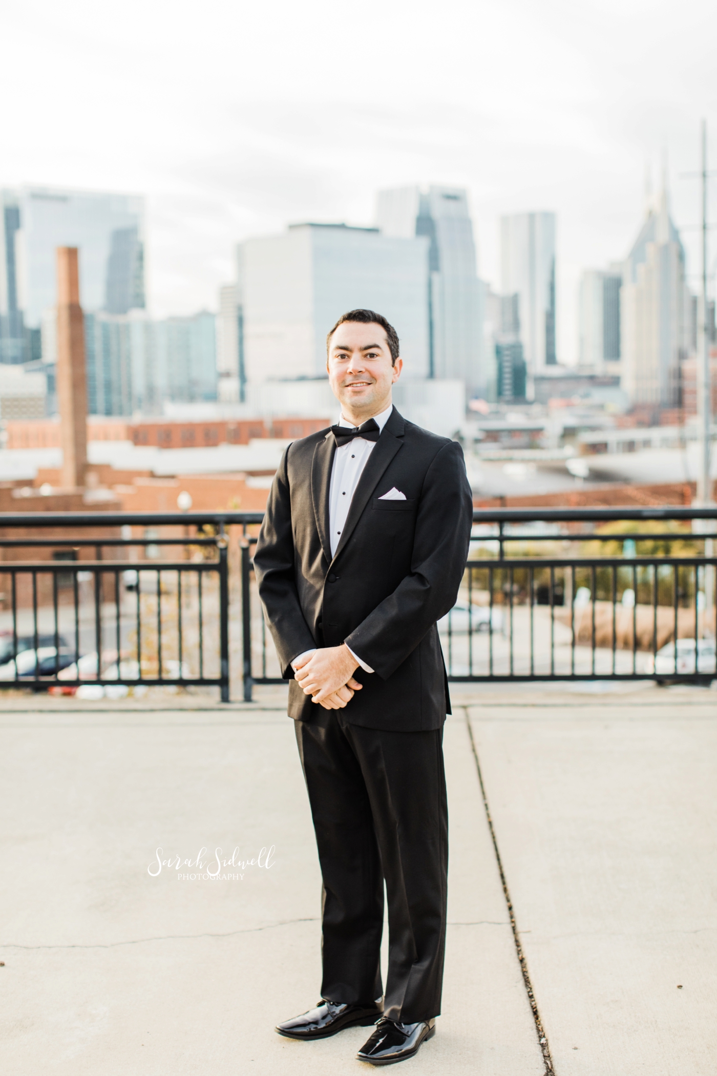 A man stands on a rooftop | Sarah Sidwell Photography | The Bell Tower