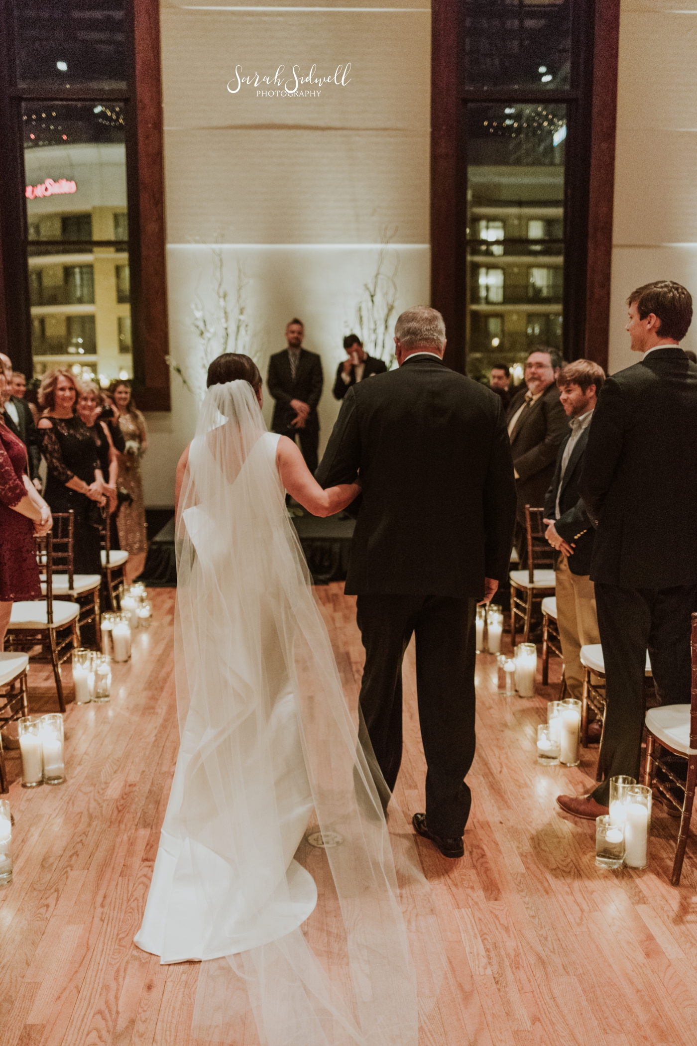 A bride walks down the aisle | Sarah Sidwell Photography | The Bell Tower