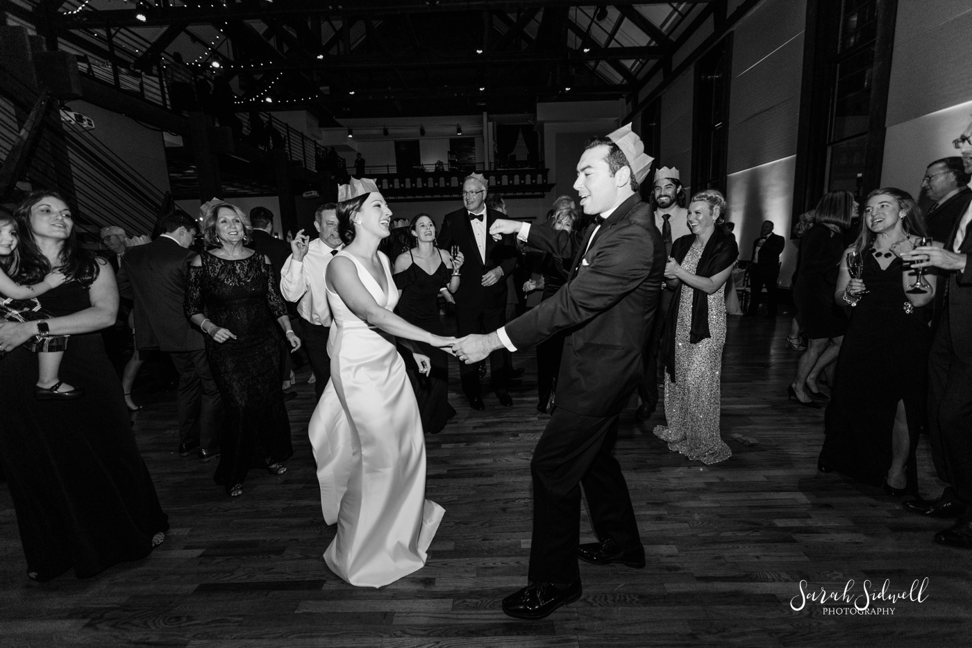 Two people dance at a wedding | Sarah Sidwell Photography | The Bell Tower