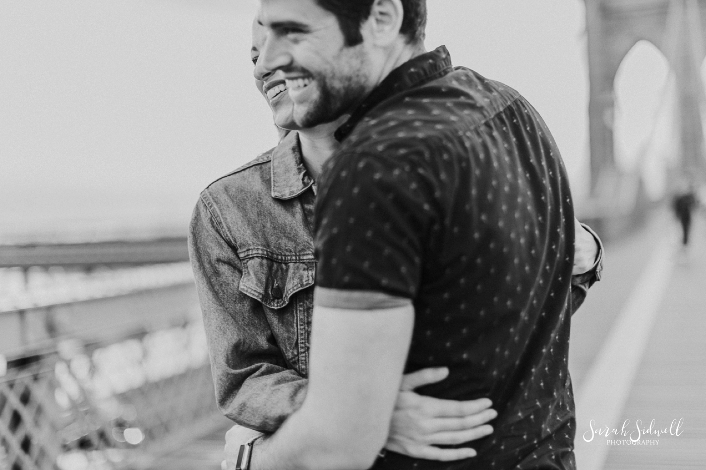 A man laughs with his fiance.  | Sarah Sidwell Photography | Nashville Engagement Photographer