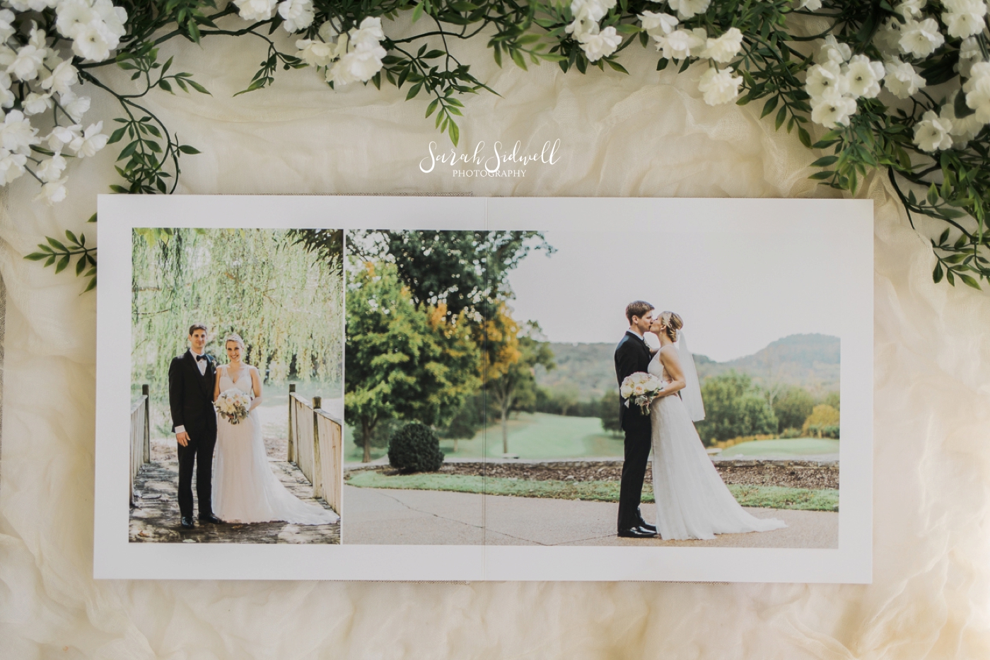 A wedding album sits on a table, opened. 
