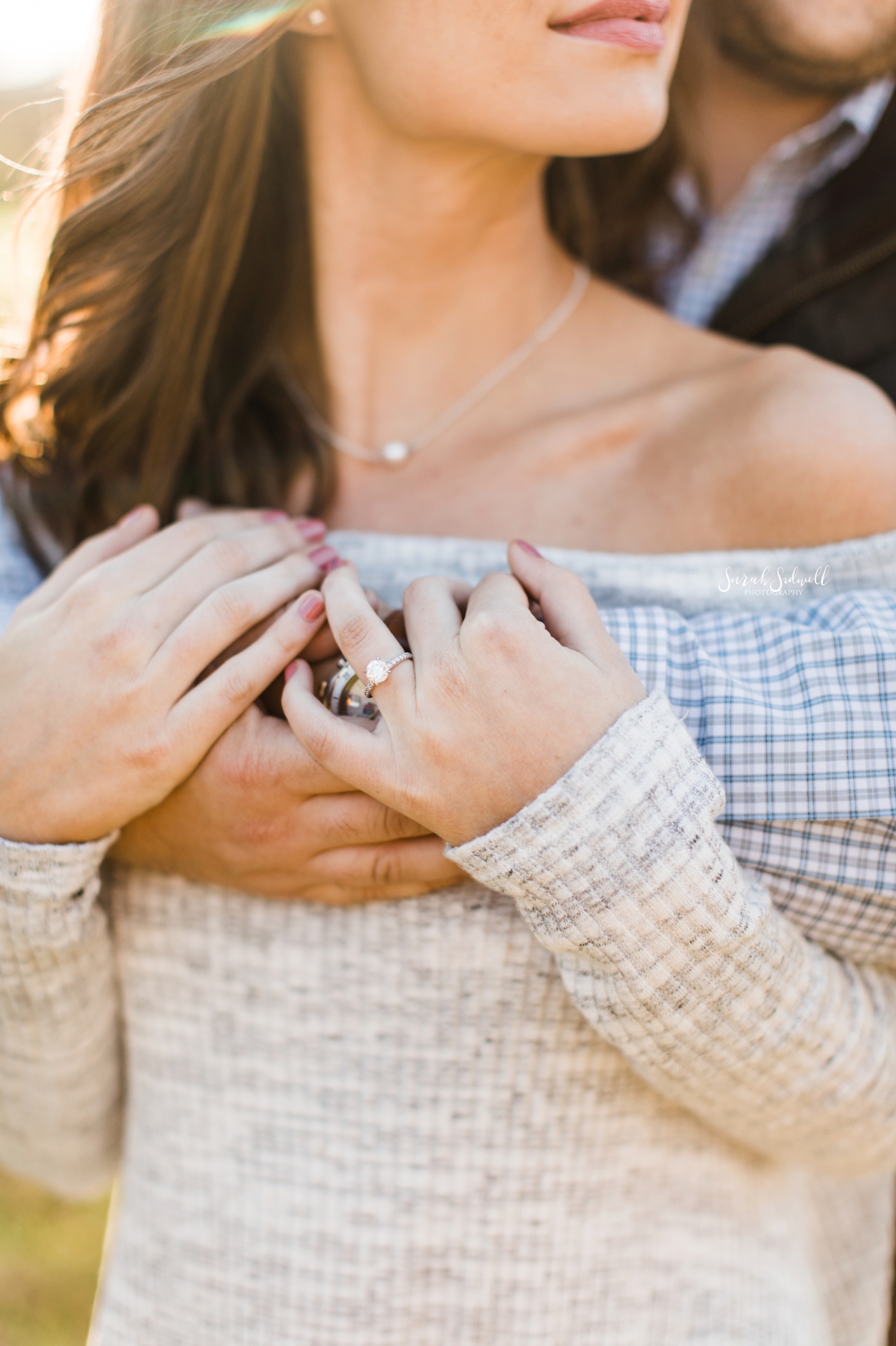A man gives his fiance a hug | Nashville Engagement Photography