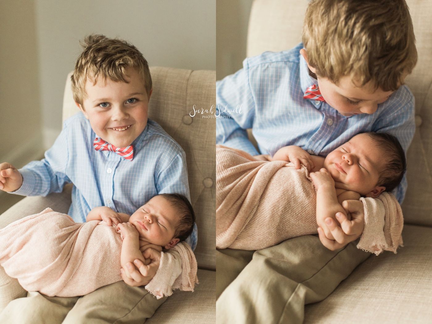 A little boy holds his new sister. 