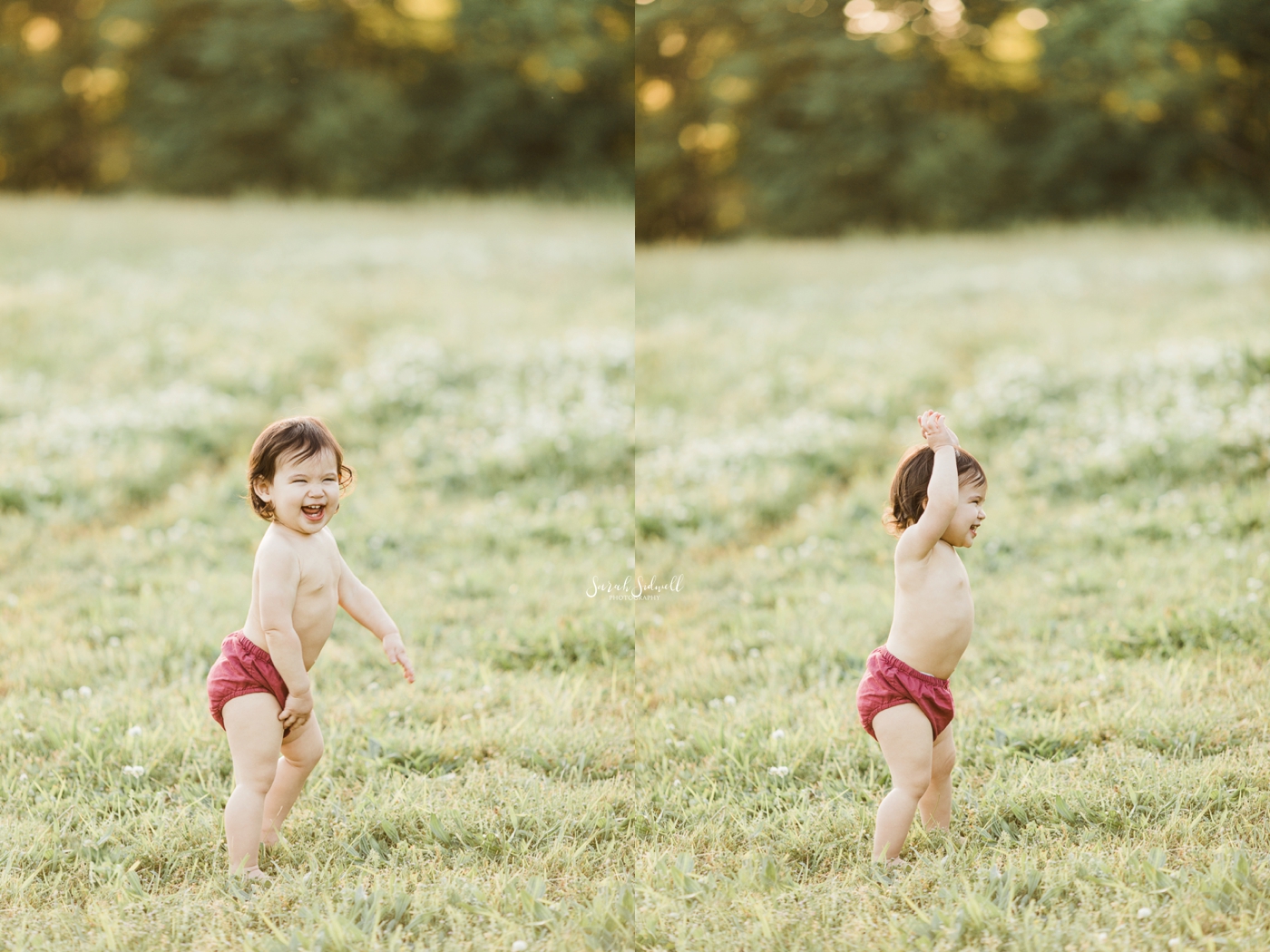 A baby plays in a grassy field wearing only bloomers. 