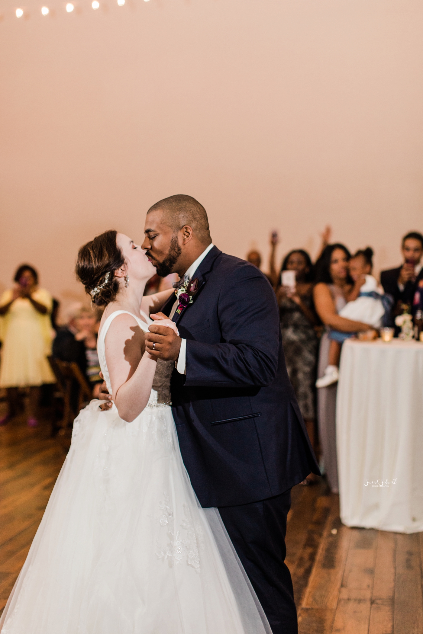 A bride and groom share their first dance at their Cordelle wedding. 