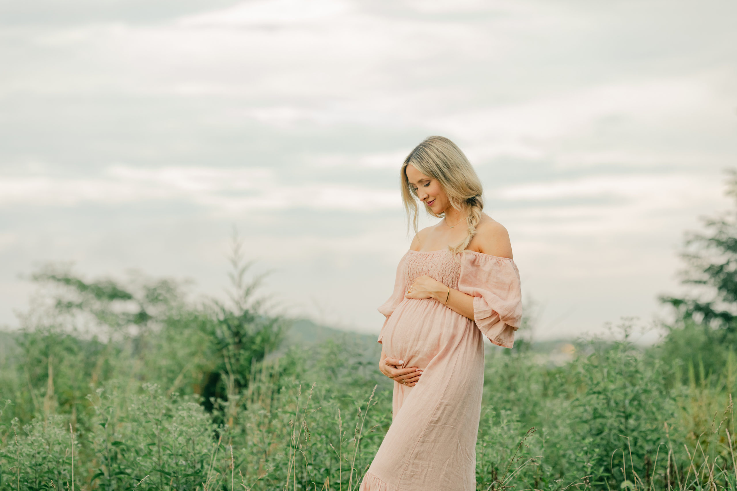 light pink off the shoulder maternity dress. outdoor maternity photo session.