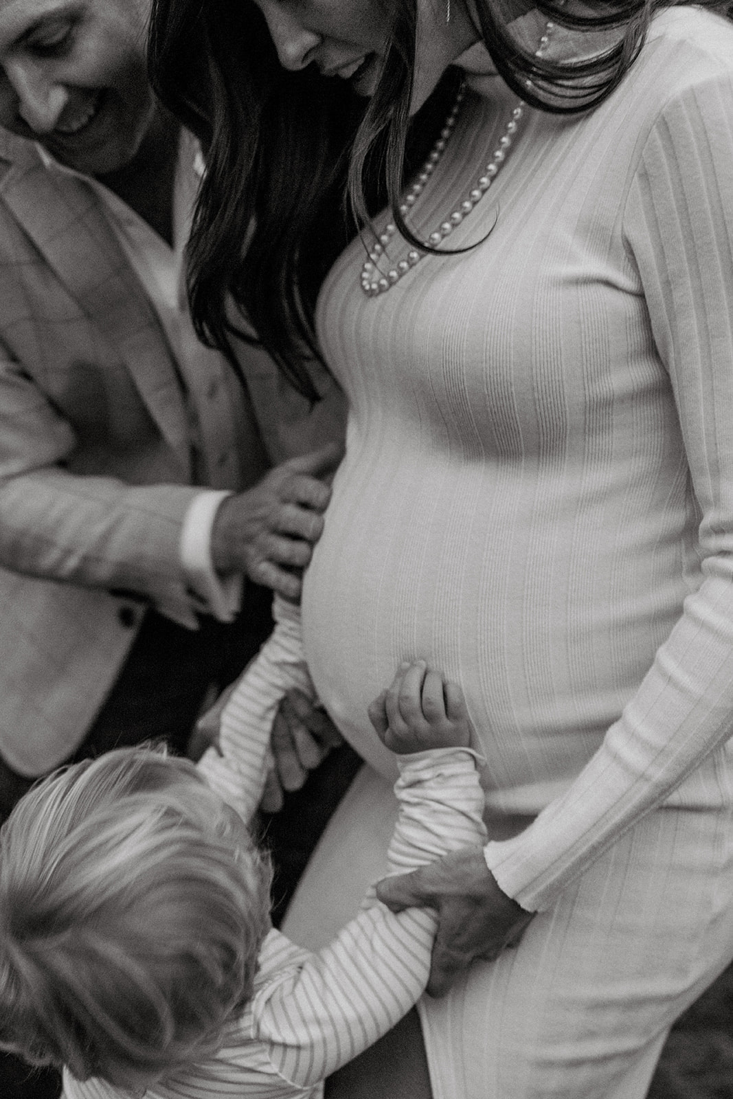 black and white moody maternity photography. family photo