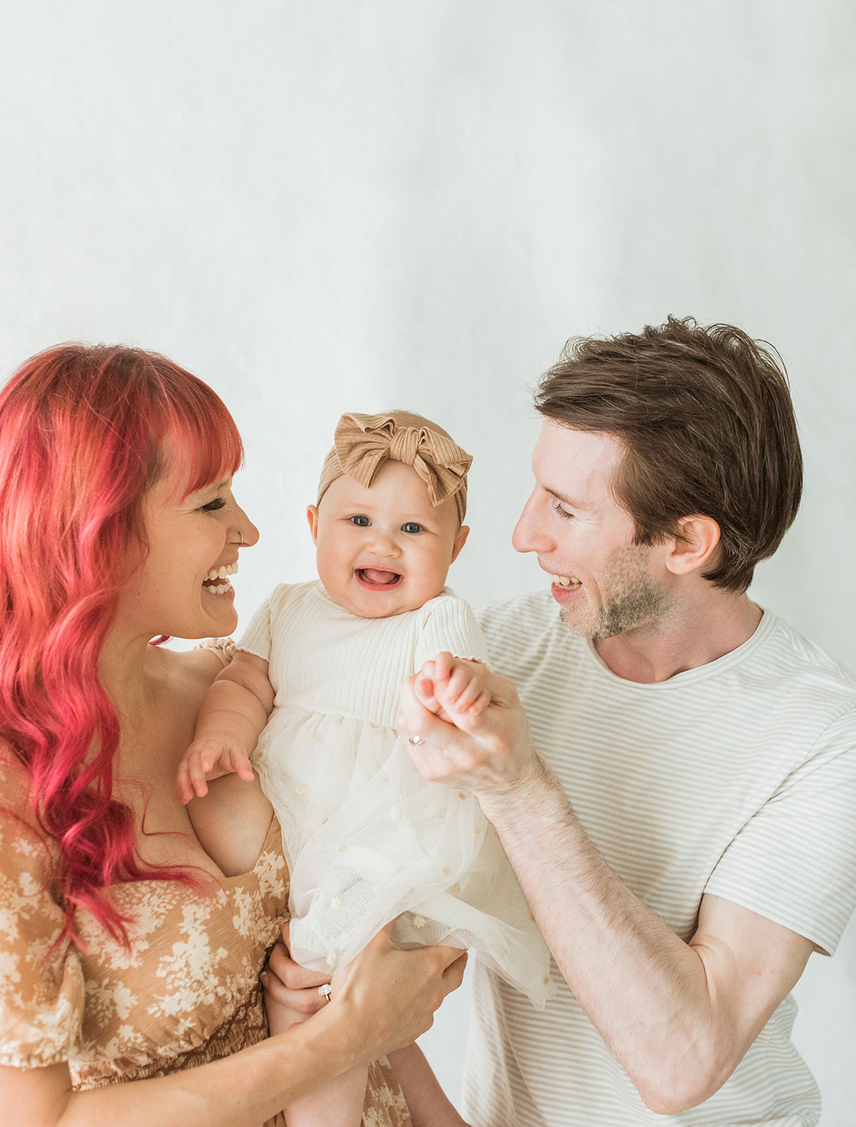 Nashville baby photographer. Mom, dad, and baby girl.