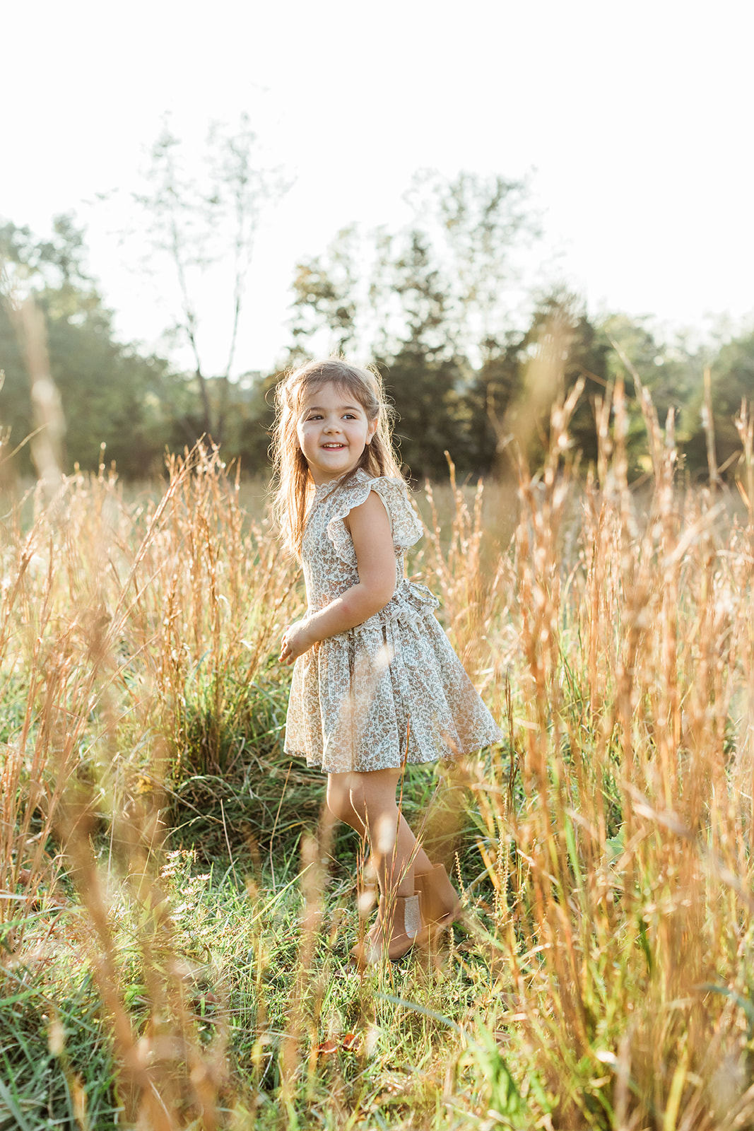 outdoor family photos in Nashville  Tennessee. little girl in field