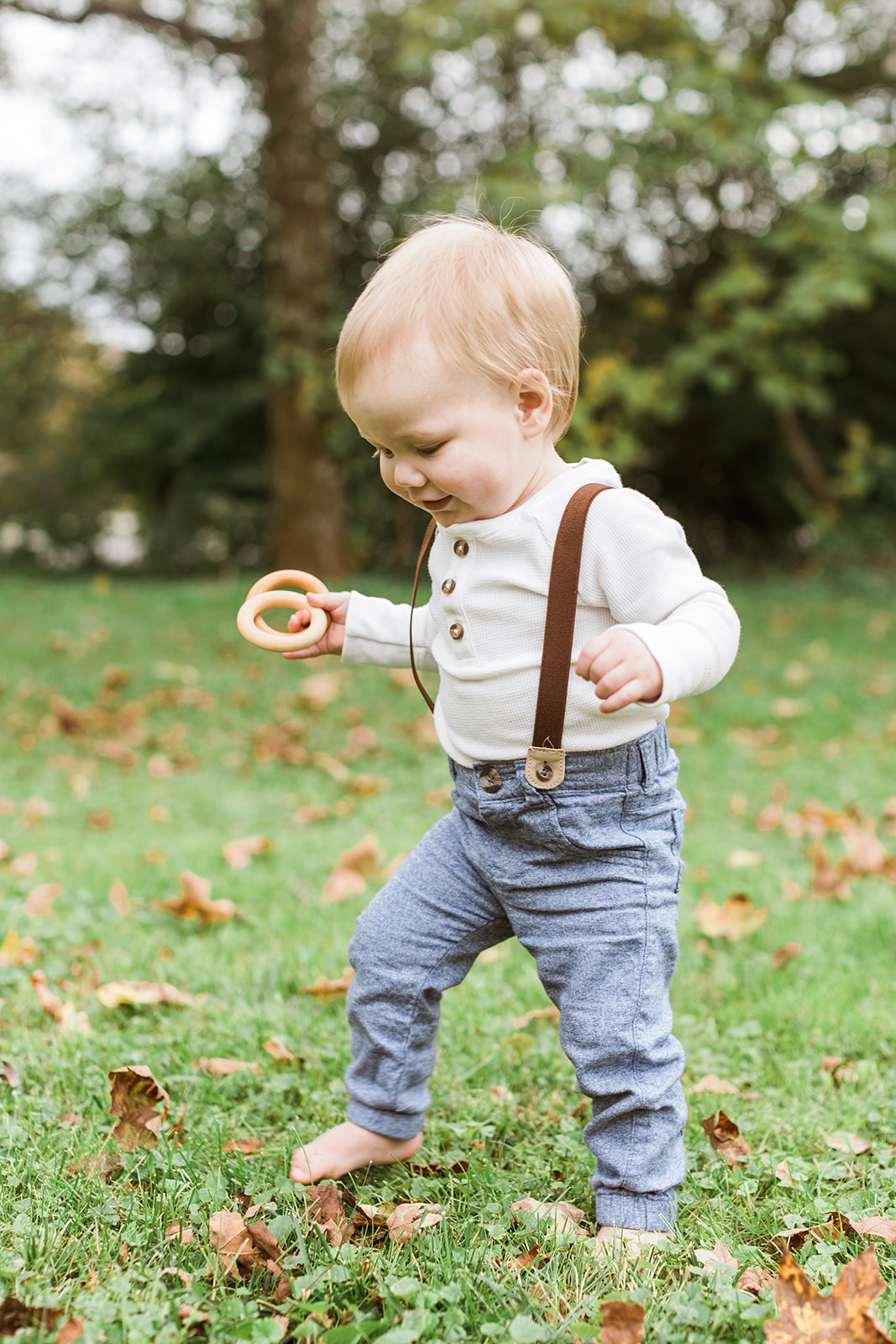 1 year old photo shoot in nashville tennessee. baby boy walking outdoors