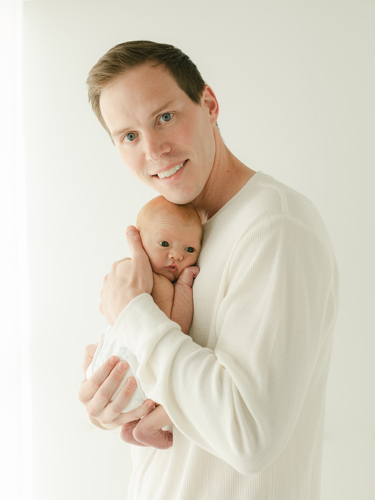 newborn baby session in nashville tennessee. photo of dad and baby boy