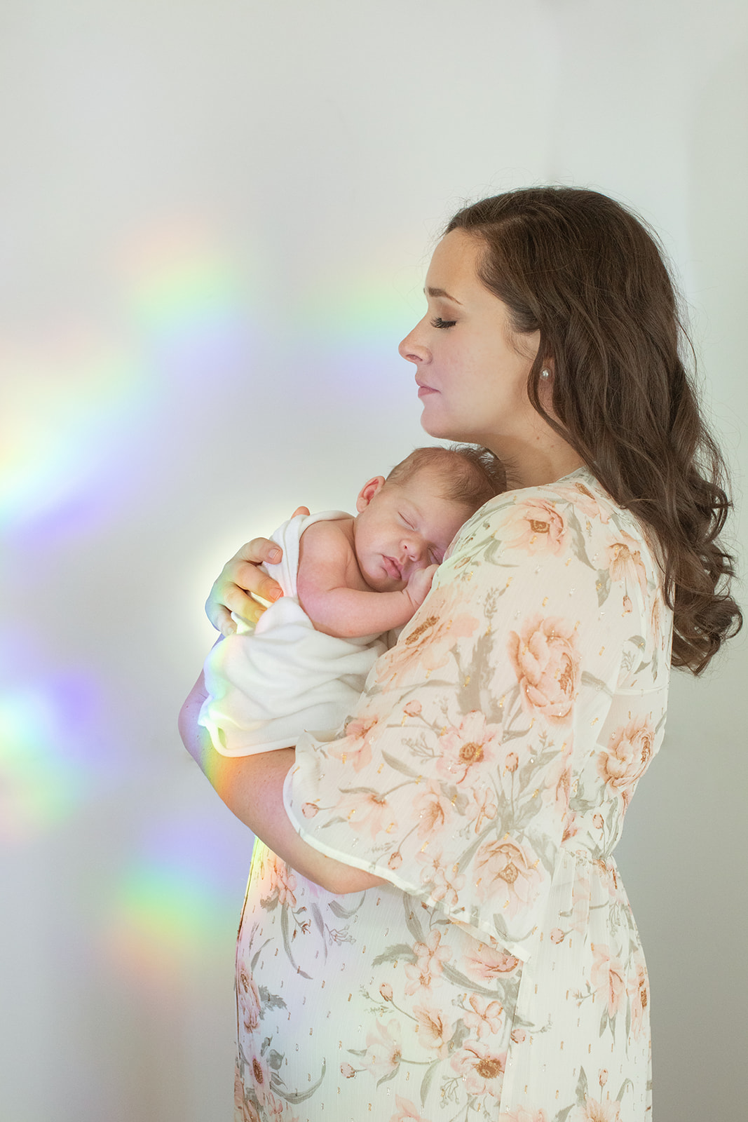 nashville newborn session. photo of mom and newborn baby girl. rainbow baby