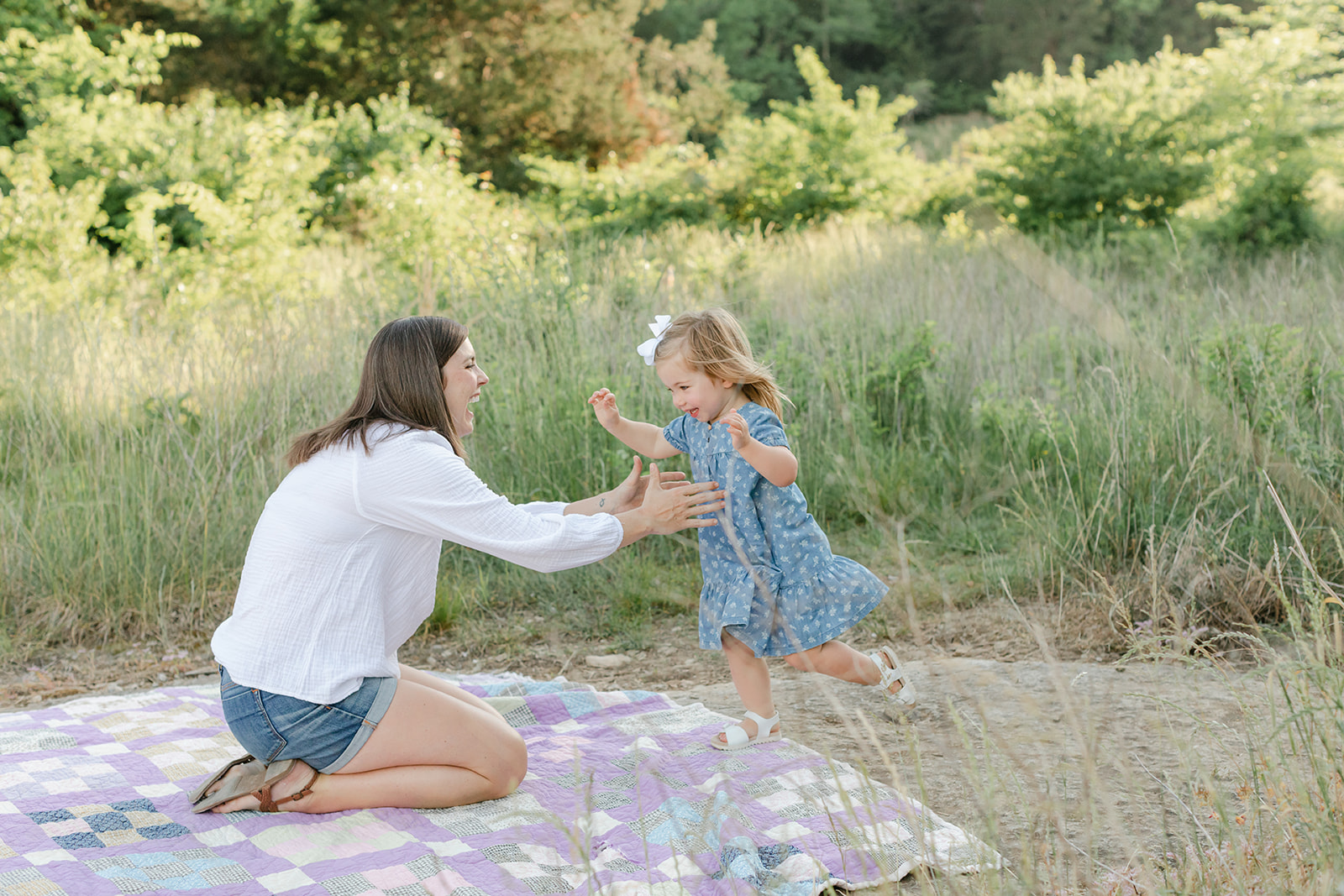 outdoor family photos for 2 year baby milestone session in nashville tennessee. photo of mom and daughter