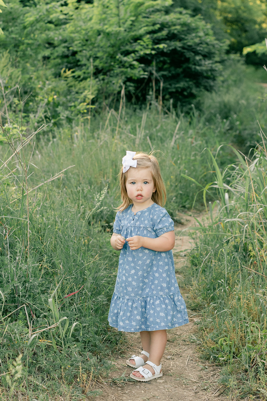 outdoor family photos for 2 year baby milestone session in nashville tennessee. photo of little girl