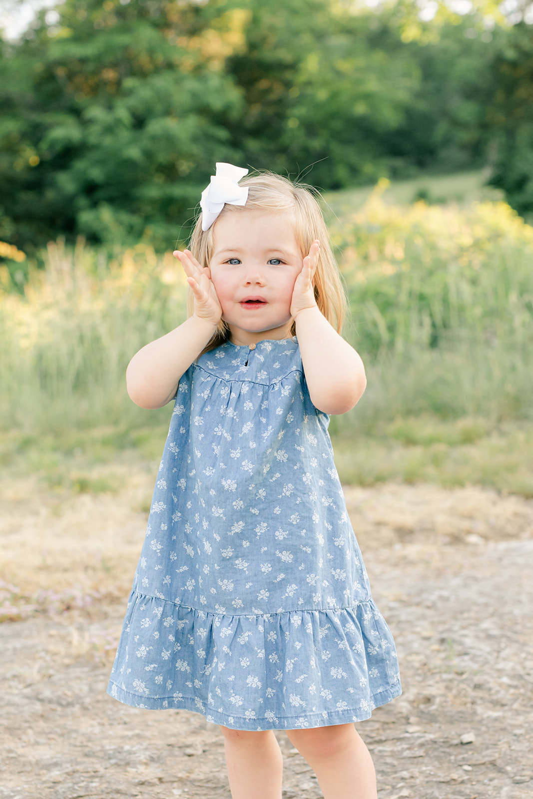 outdoor family photos for 2 year baby milestone session in nashville tennessee. photo of little girl