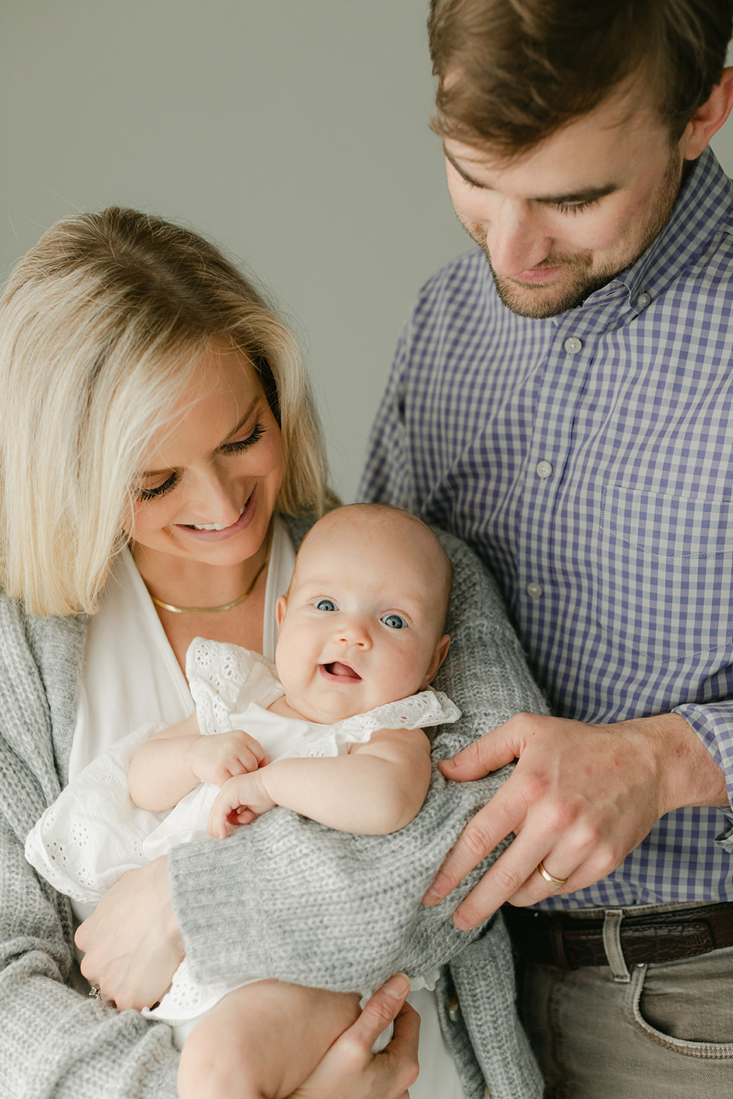 baby Charolette's 3 month milestone session in Nashville, Tennessee. photo of mom, dad and baby girl