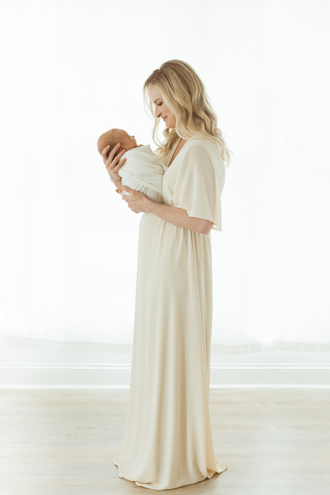 baby Charolette's newborn session in Nashville, Tennessee. photo of mom and baby girl