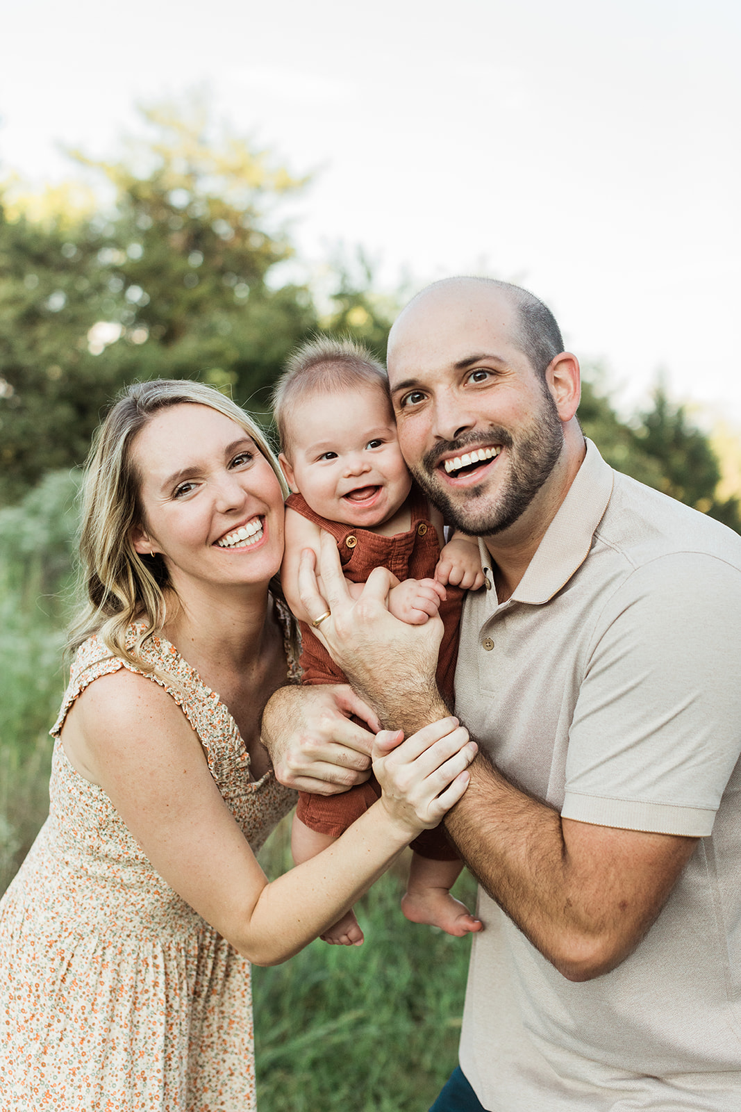 6 month milestone session in nashville studio. parents with son