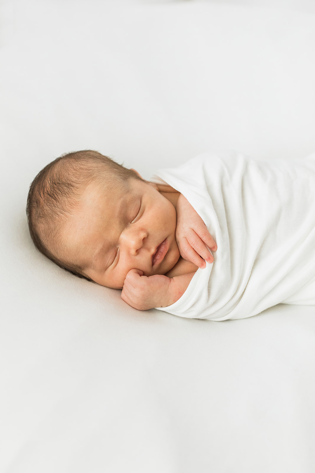 newborn baby boy photo session in nashville studio. sleepy baby boy