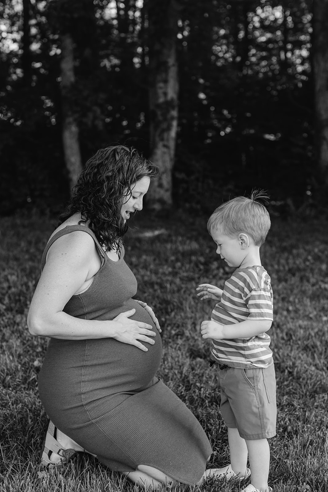 Pregnant mama with son. Backyard summer family session in Nashville, TN