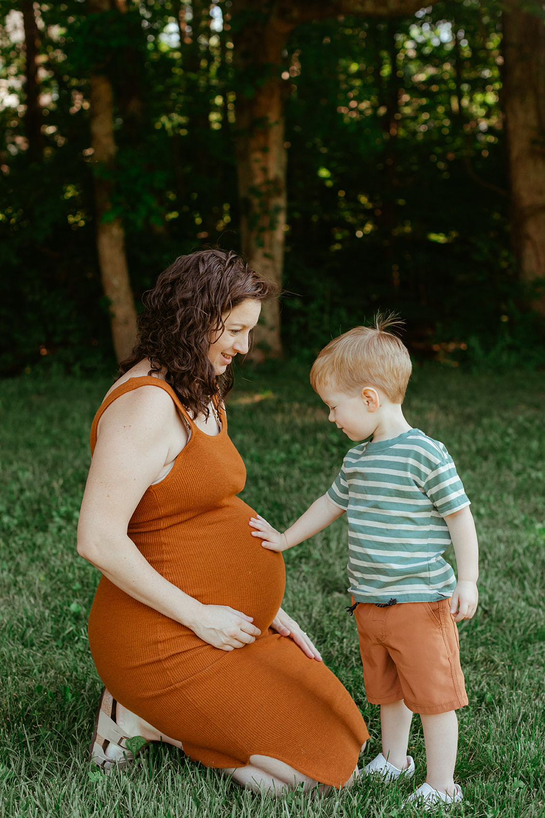 Pregnant mama with son. Backyard summer family session in Nashville, TN