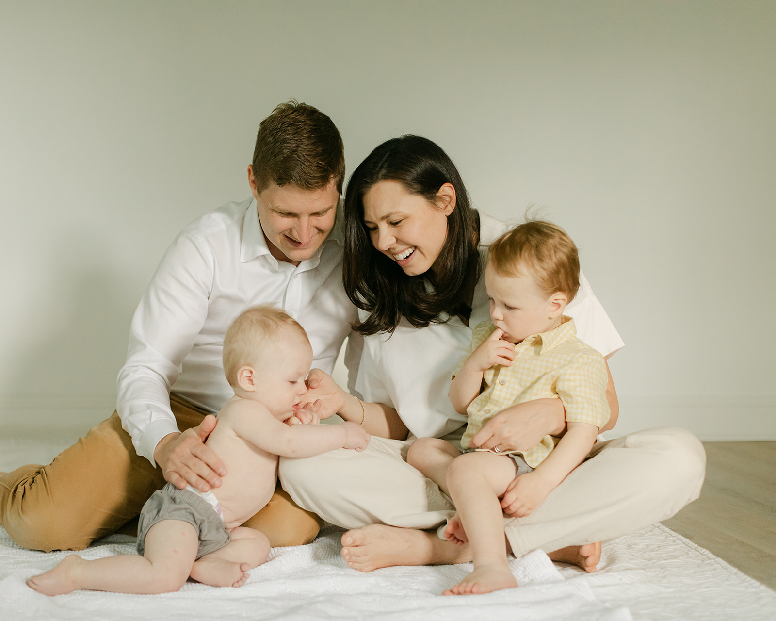 Family of four (mom, dad, two young boys). At-home family photos in Nashville.