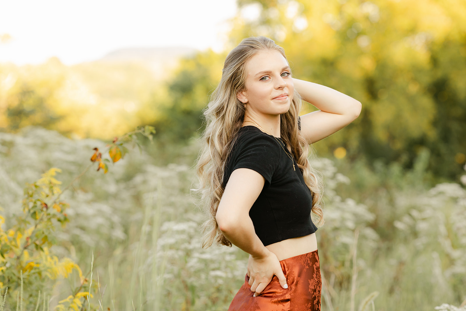 golden hour senior photos in open field