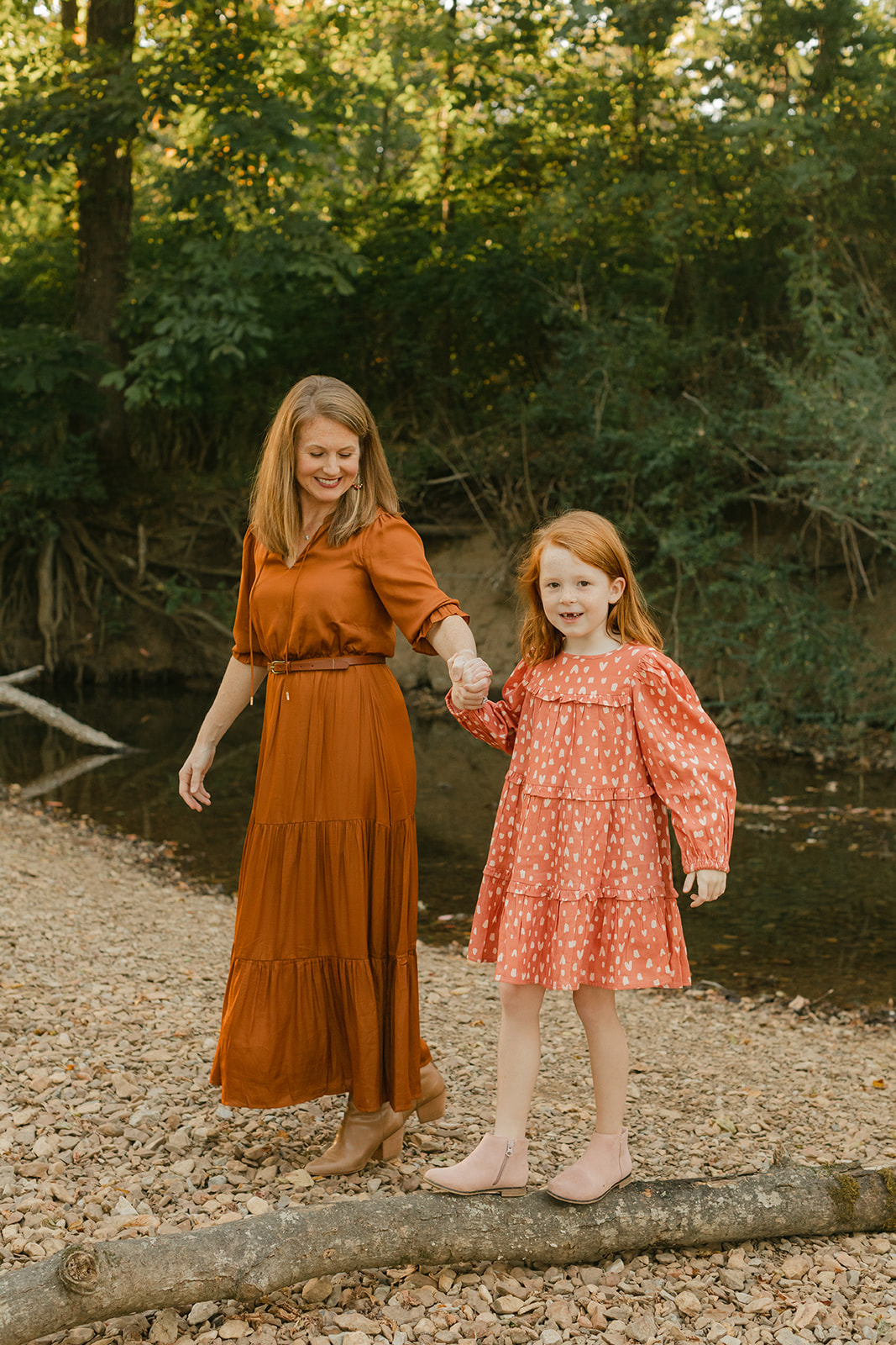 mom and daughter during fall family photos at West Nashville Creek