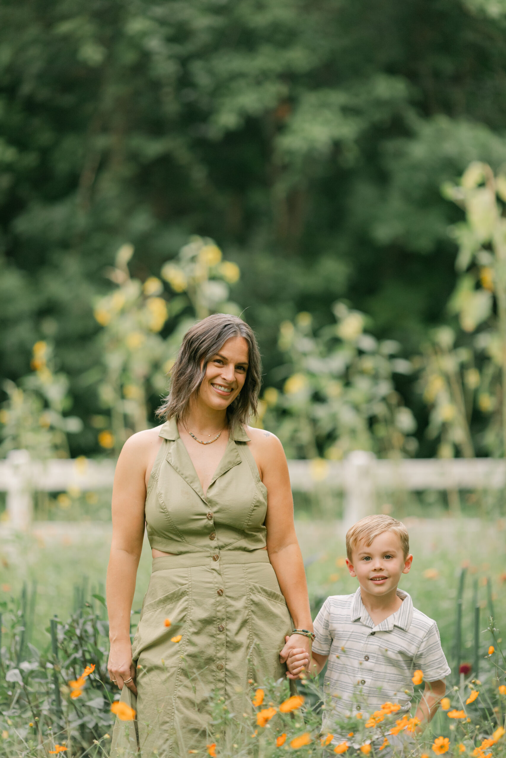 mama with her toddler boy in the garden during motherhood minis