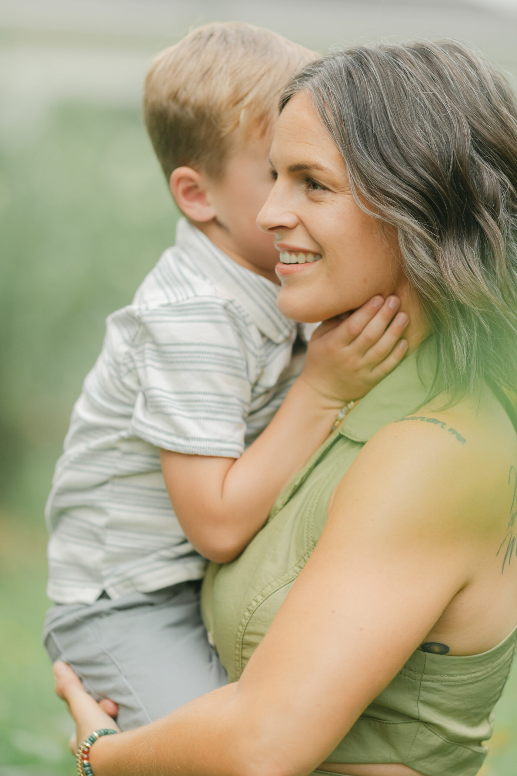 mama with her toddler boy in the garden during motherhood minis