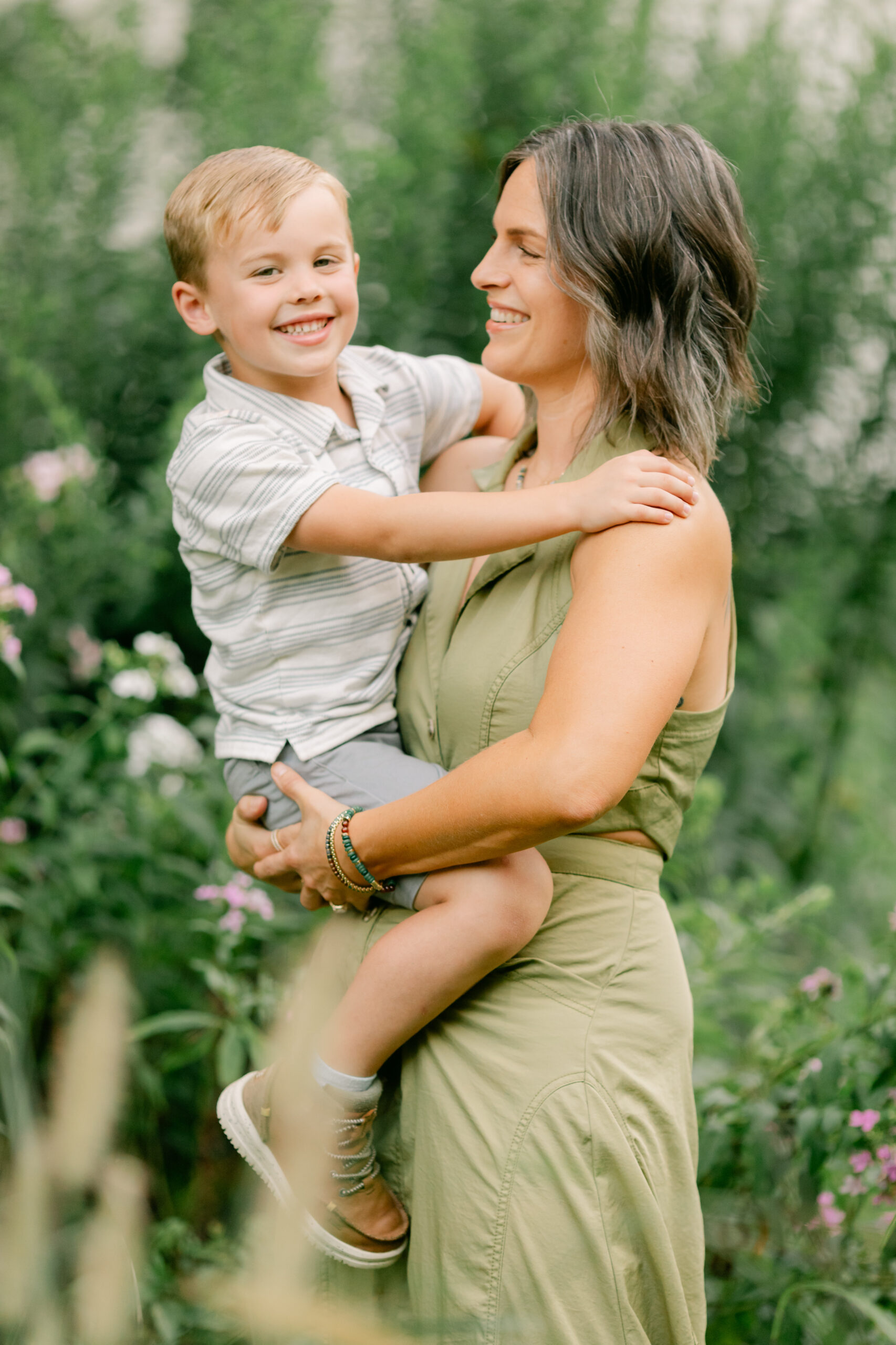 mama with her toddler boy in the garden during motherhood minis