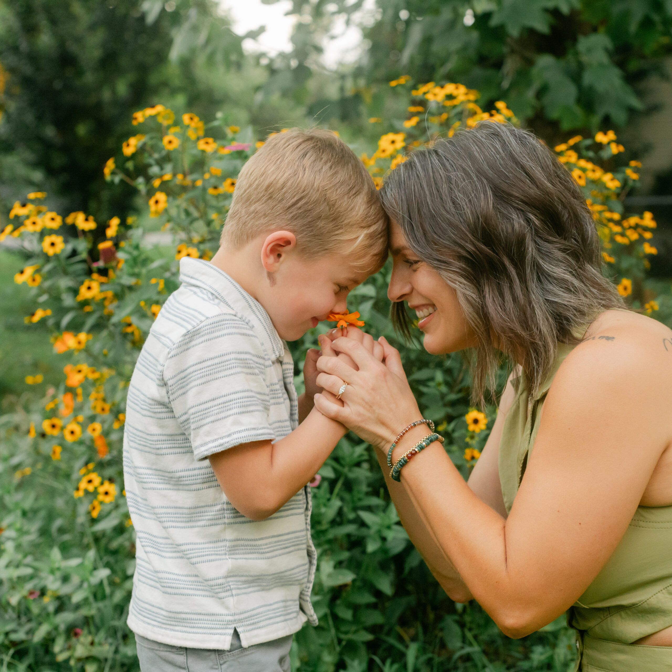 mama with her toddler boy in the garden during motherhood minis