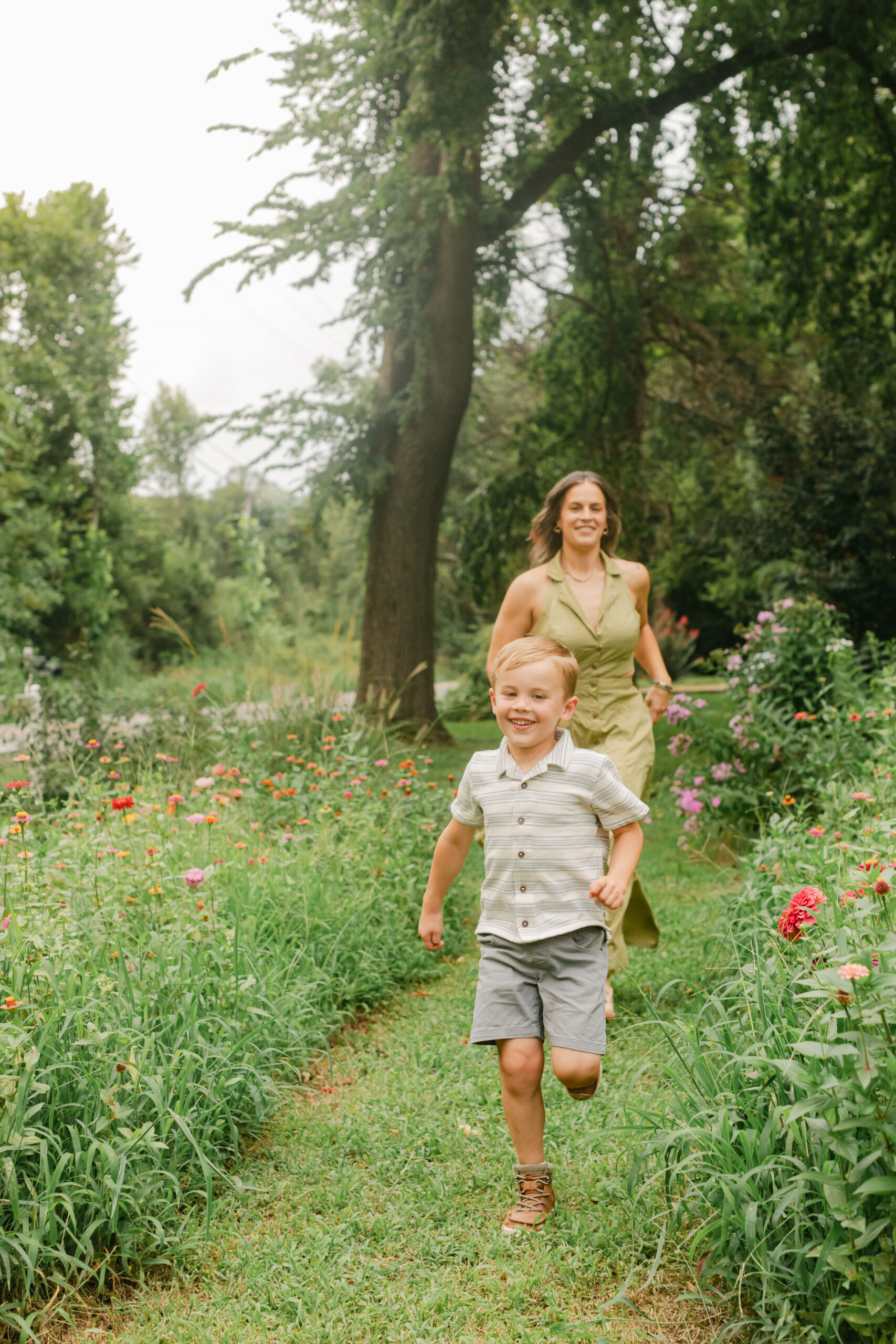 mama with her toddler boy in the garden during motherhood minis