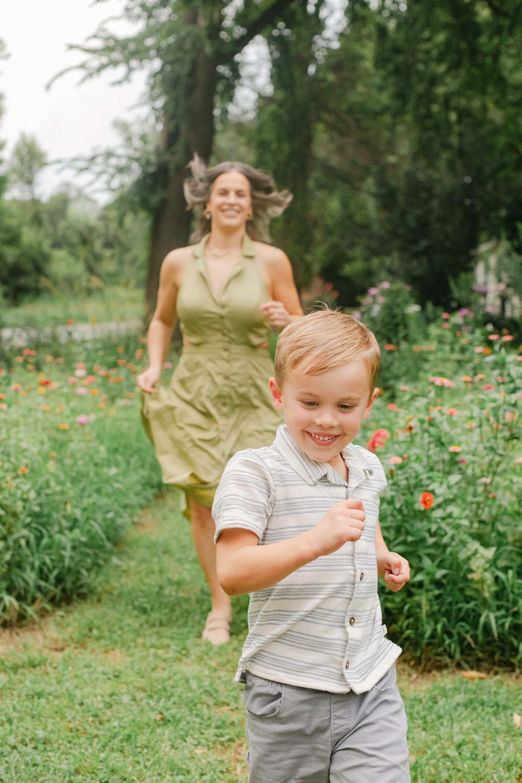 mama with her toddler boy in the garden during motherhood minis