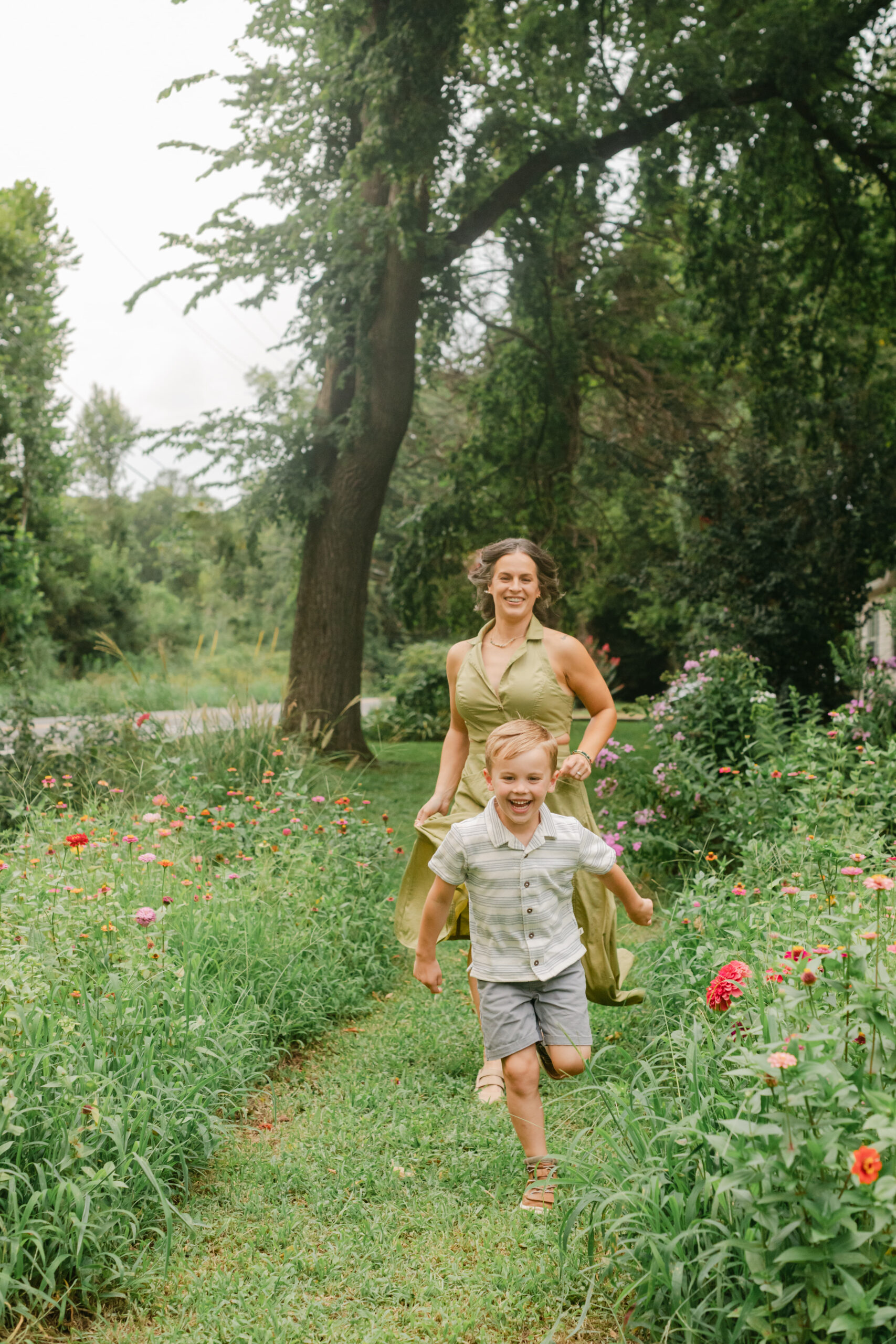 mama with her toddler boy in the garden during motherhood minis