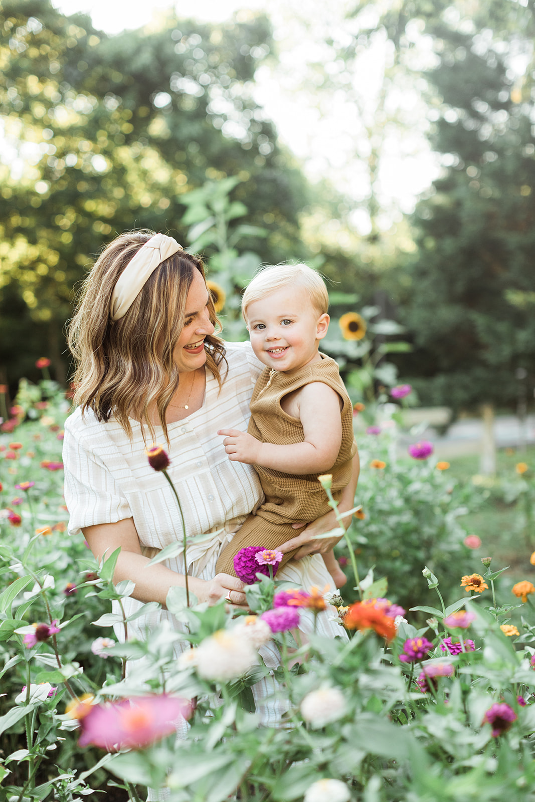 mama with baby boy in the garden during motherhood minis