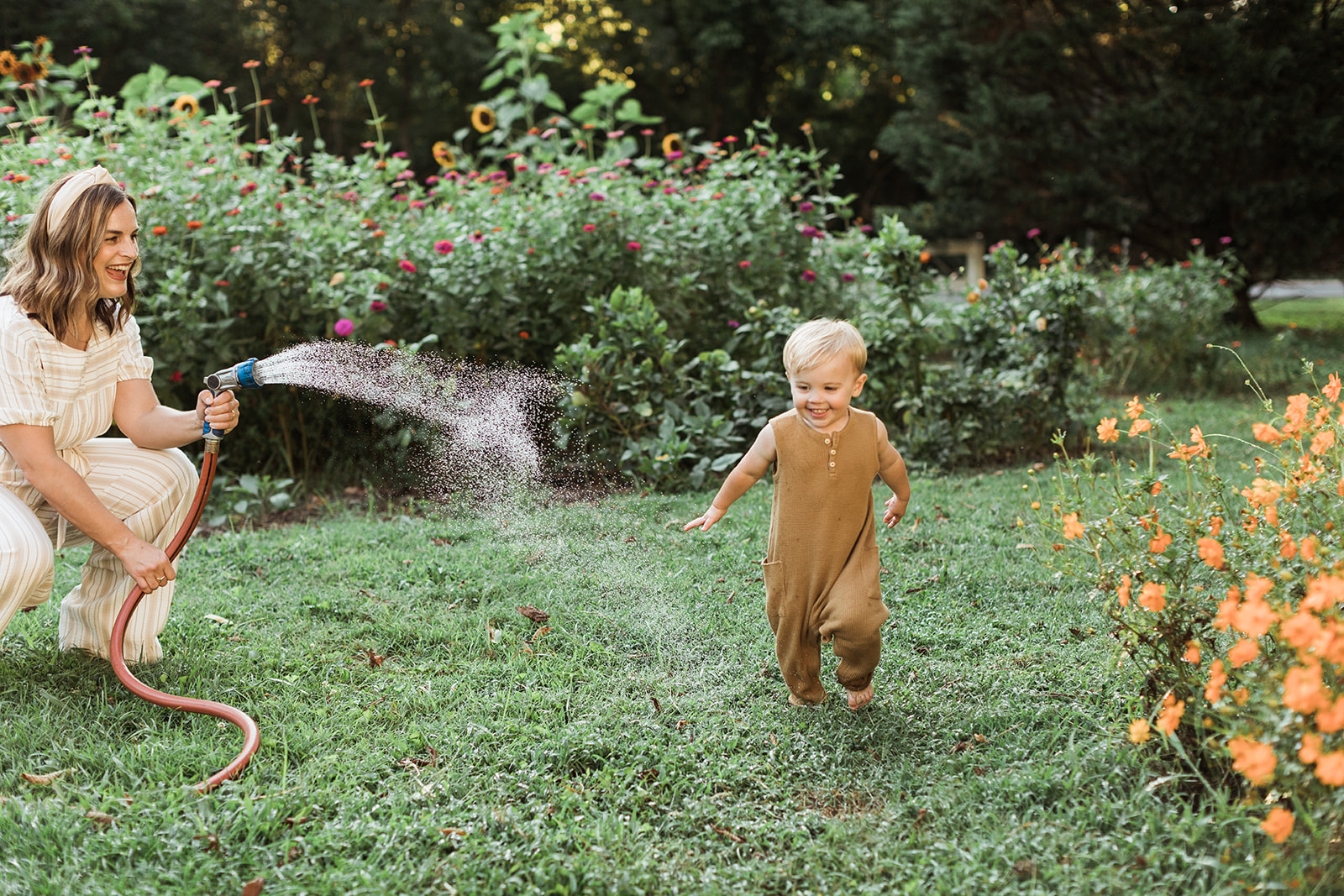 mama with her young boy in the garden during motherhood minis