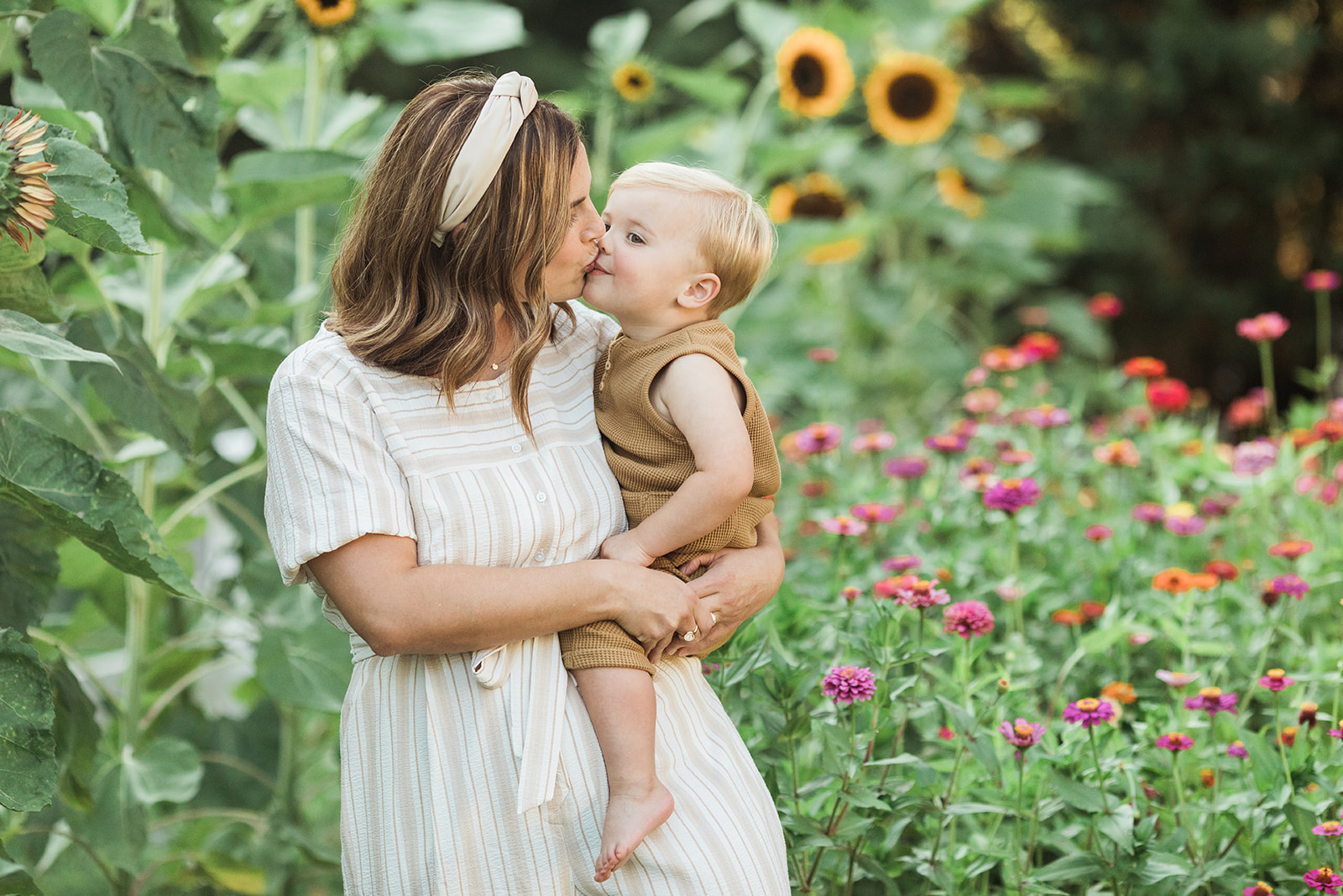 mama with baby boy in the garden during motherhood minis