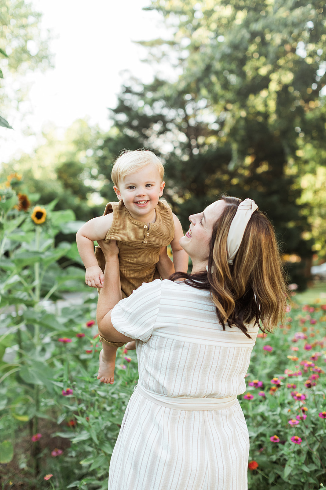 mama with baby boy in the garden during motherhood minis