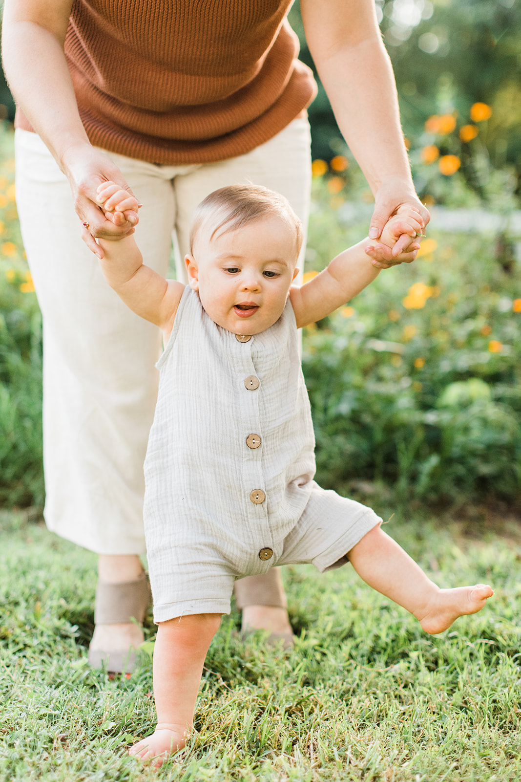 mama with baby boy in the garden during motherhood minis