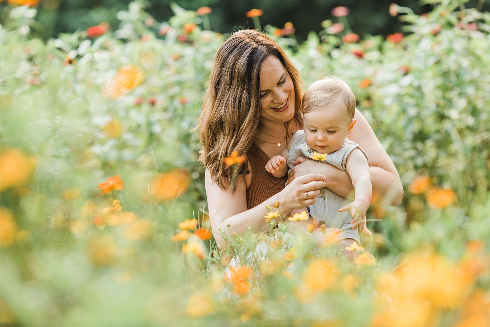 mama with baby boy in the garden during motherhood minis