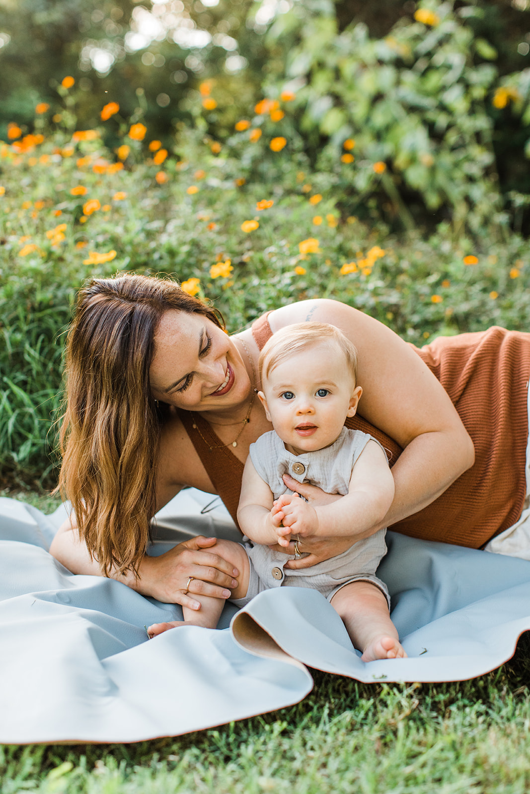 mama with baby boy in the garden during motherhood minis