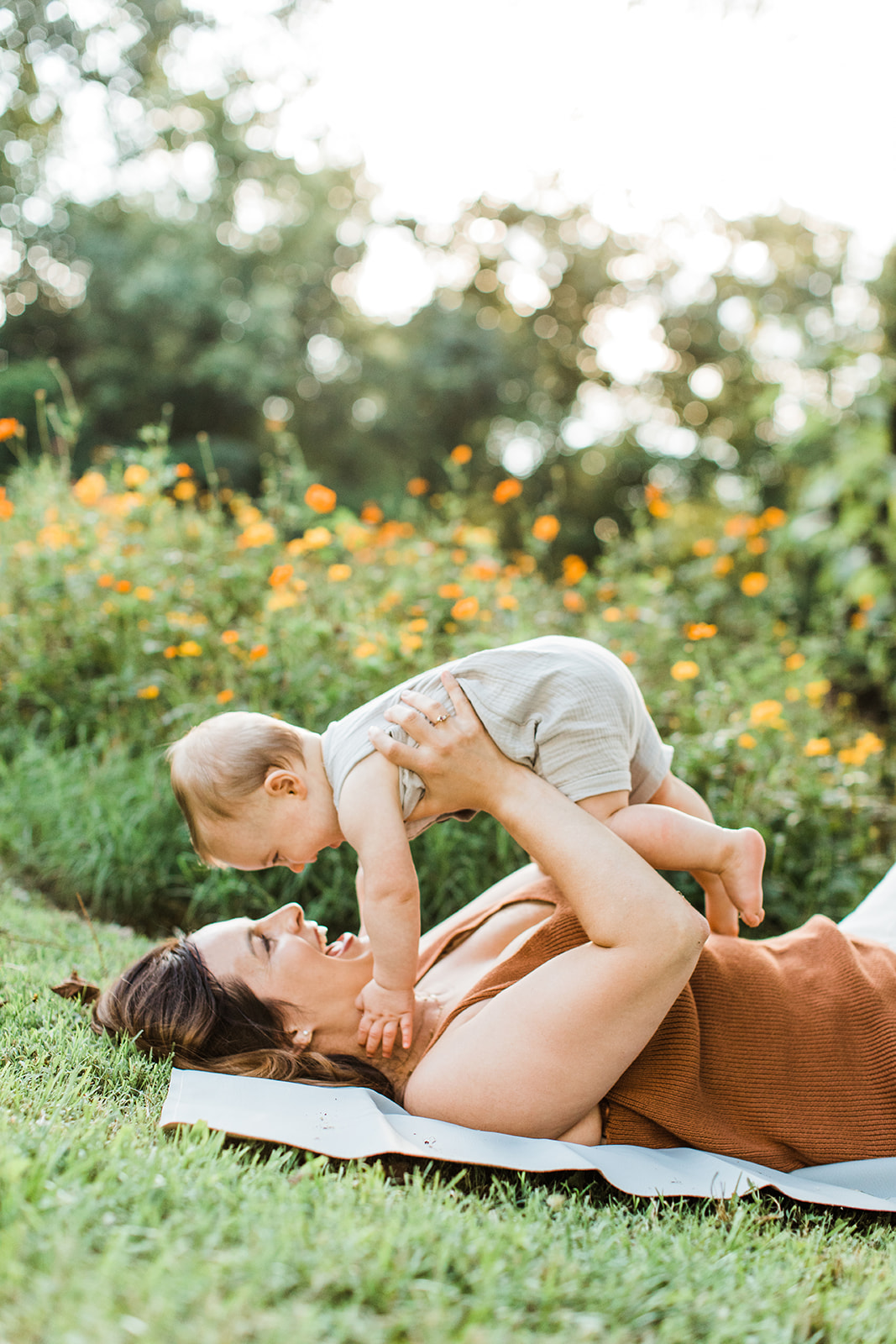 mama with baby boy in the garden during motherhood minis