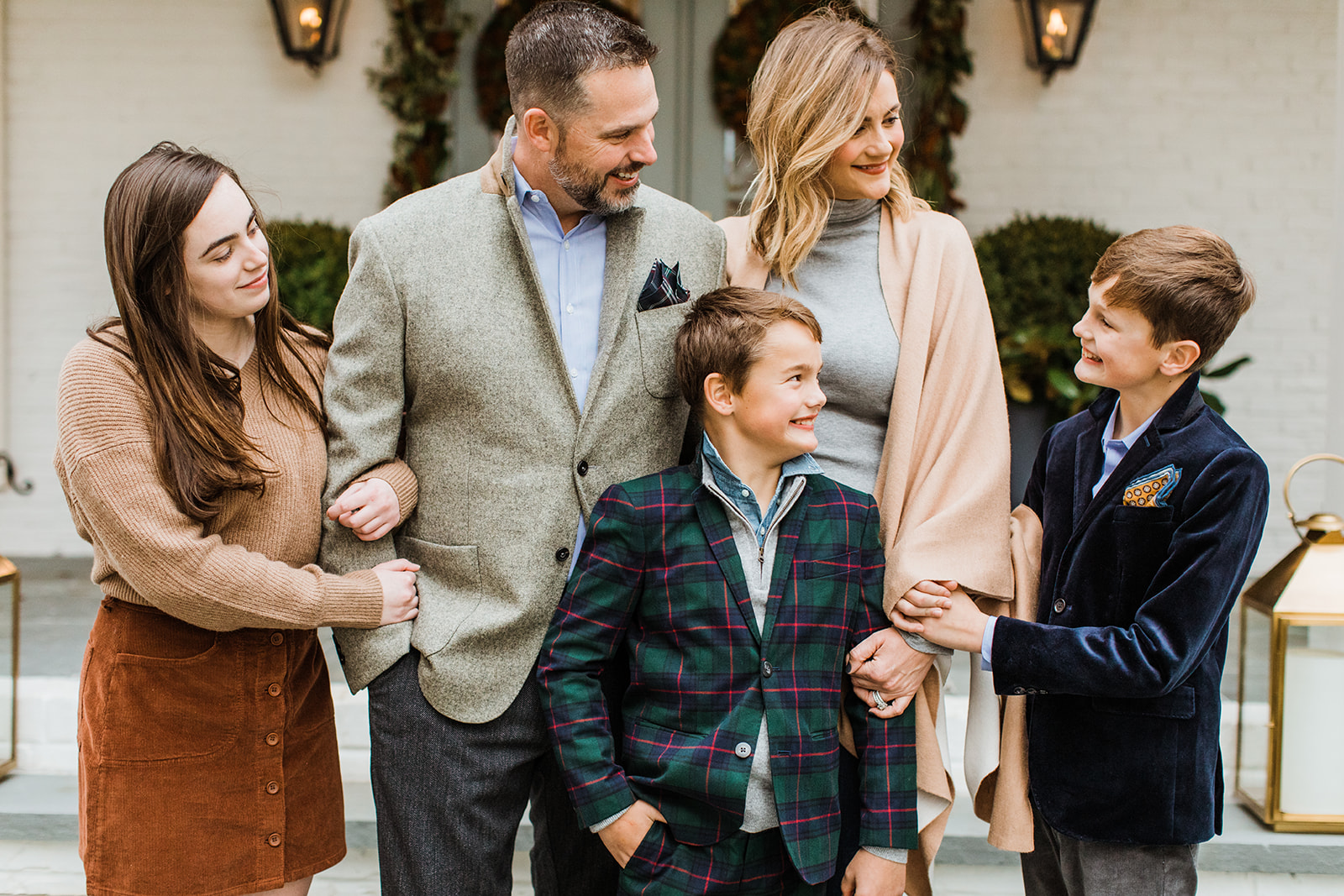 christmas family photos in front of home